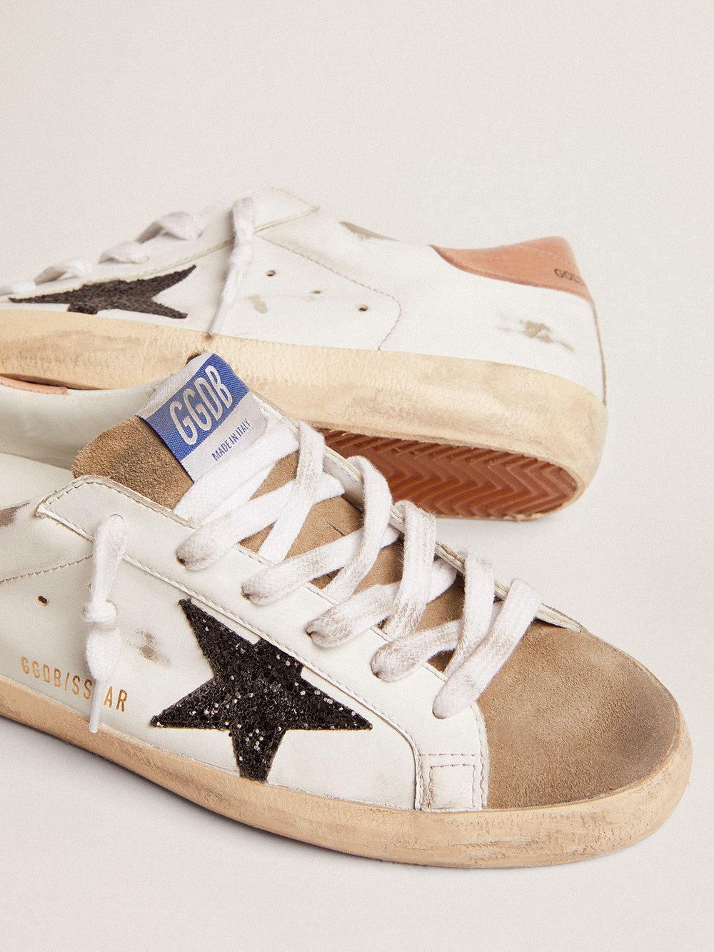 Golden Goose Women's Super-Star with black glitter star and pink heel tab