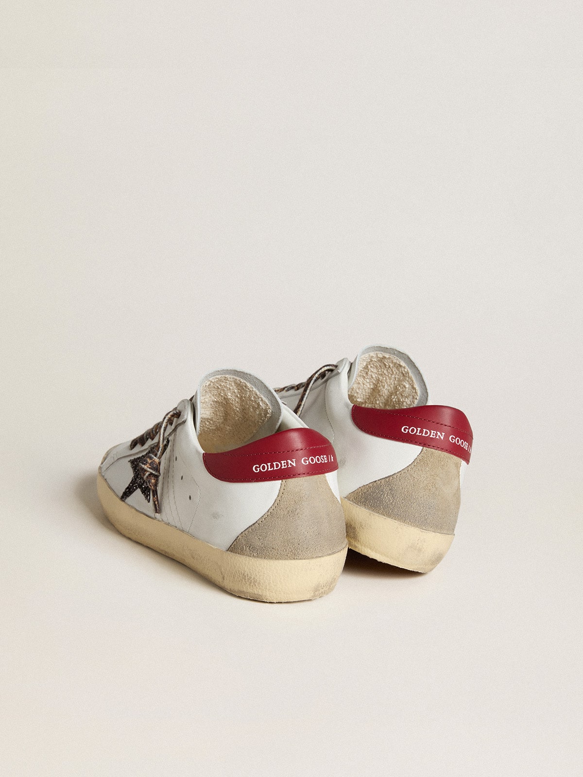 Golden Goose Women's Super-Star in nappa with glitter star and red nappa heel tab