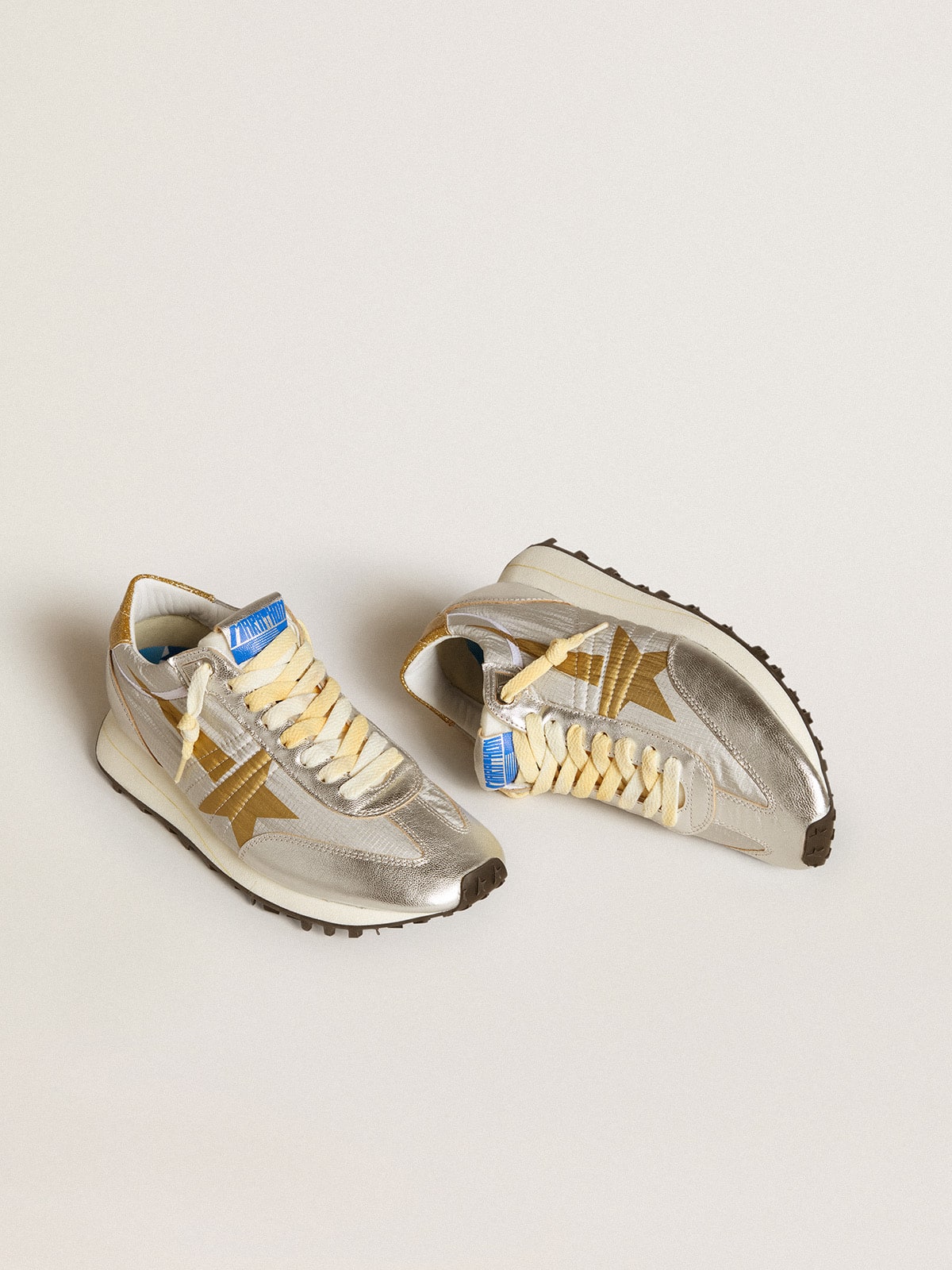 Golden Goose Women’s Marathon with silver ripstop nylon upper and gold star