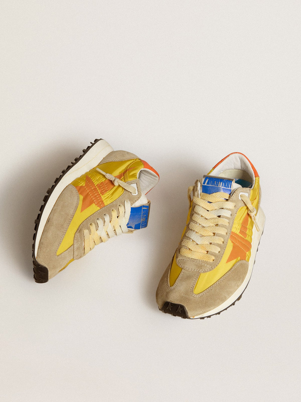 Golden Goose Women’s Marathon with yellow nylon upper and orange star