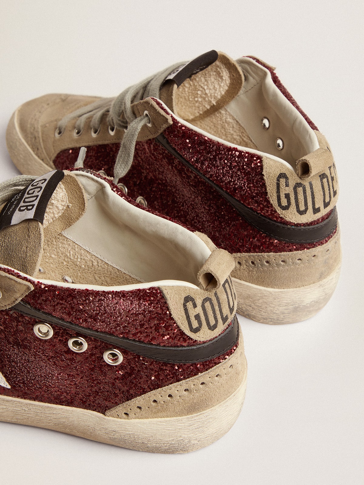 Golden Goose Women's Mid Star in burgundy glitter with gray inserts and white star