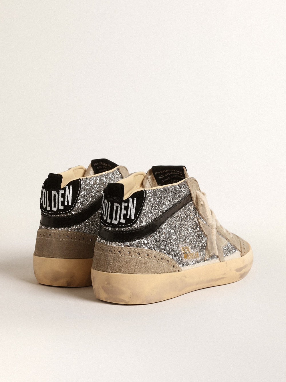 Golden Goose Mid Star in silver glitter with suede star and black flash