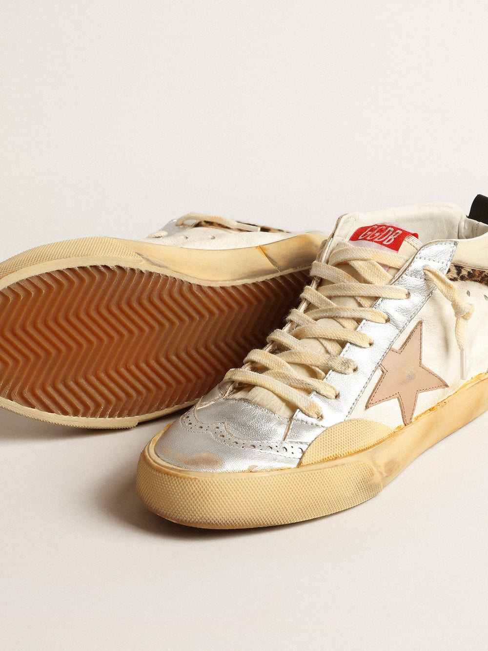 Golden Goose Mid Star LTD with silver metallic leather inserts and pink star