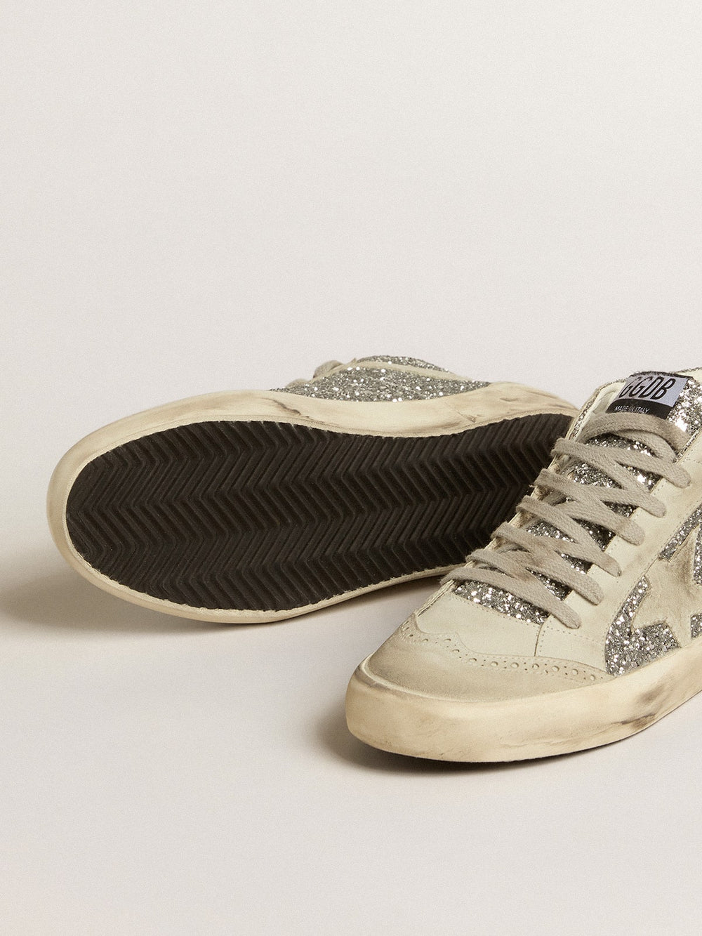 Golden Goose Mid Star in silver glitter with ice-gray suede star and flash