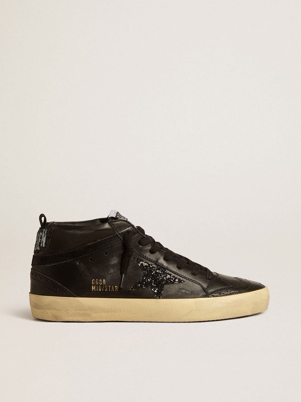 Golden Goose Women's Mid Star in black nappa with black glitter star and suede flash