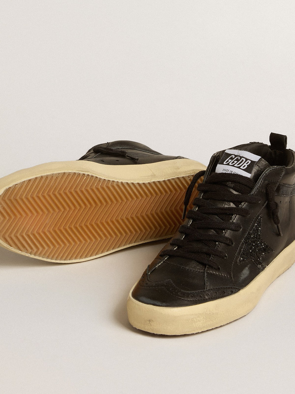 Golden Goose Women's Mid Star in black nappa with black glitter star and suede flash