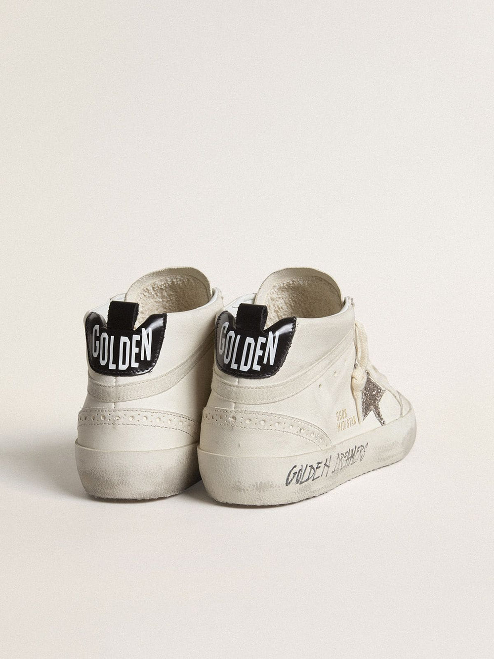Golden Goose Women's Mid Star with silver glitter star and black laminated heel tab