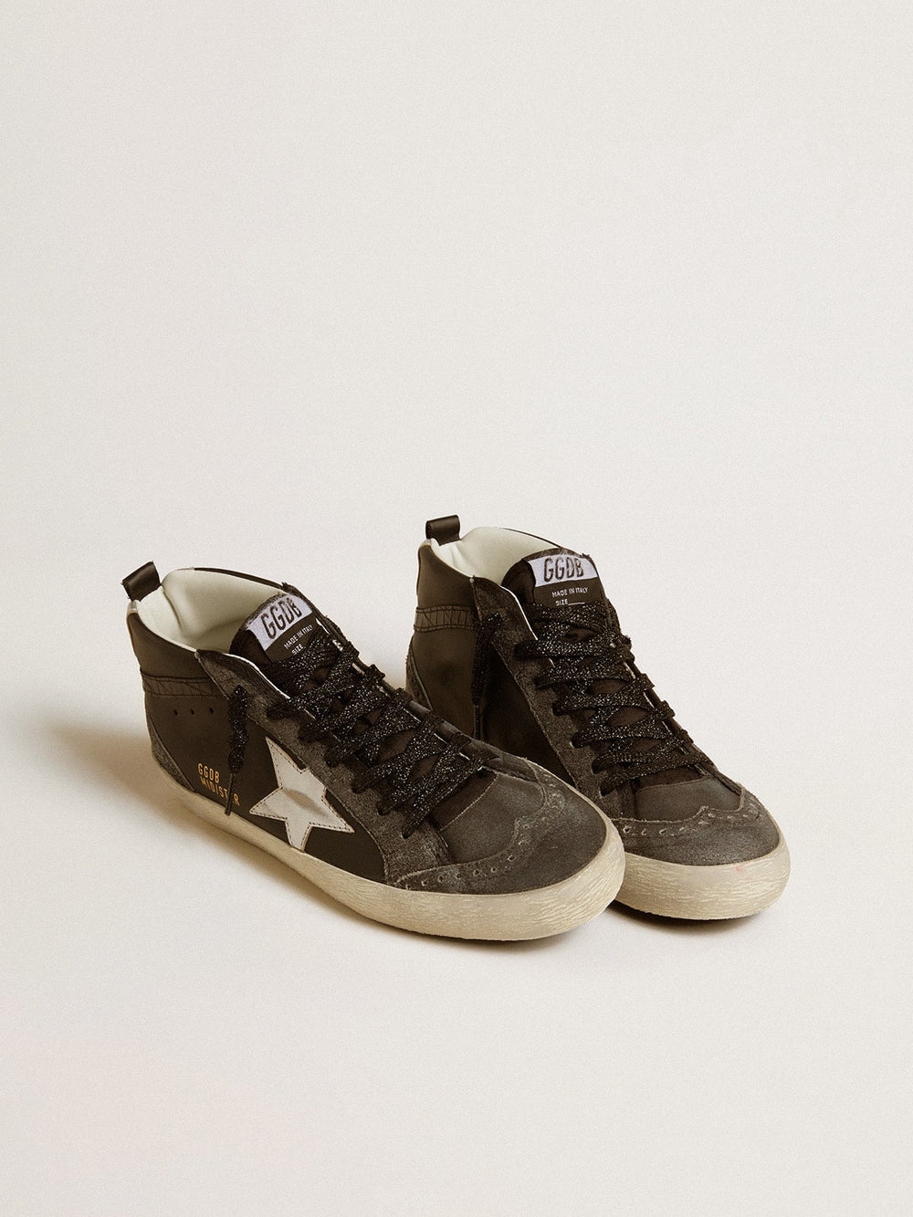 Golden Goose Women’s Mid Star in black leather with silver metallic leather star