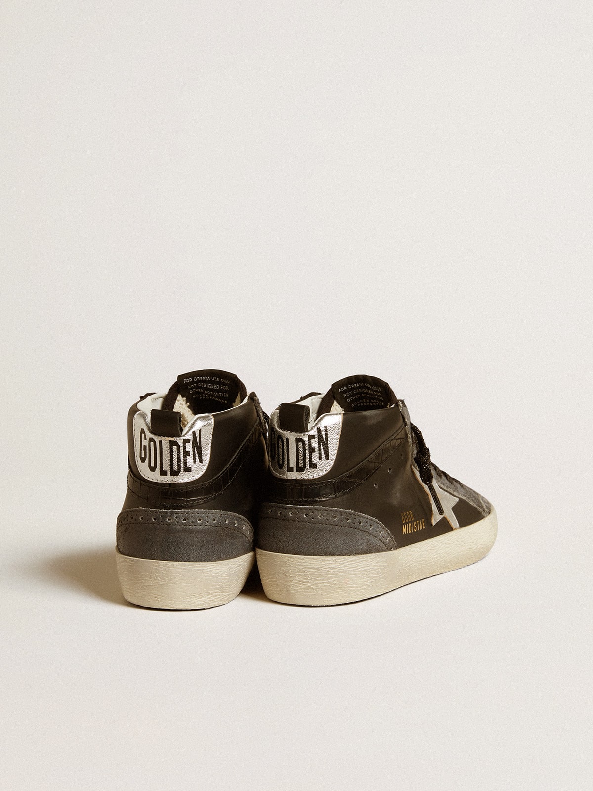 Golden Goose Women’s Mid Star in black leather with silver metallic leather star