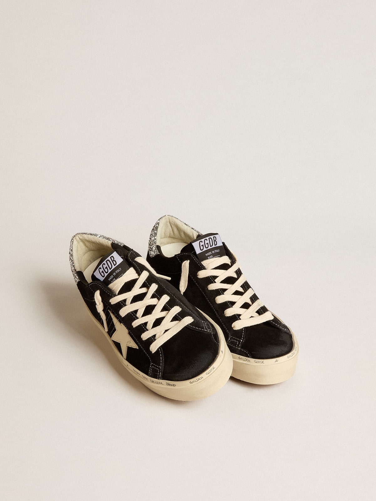 Golden Goose Women’s Hi Star in black leather with silver glitter heel tab