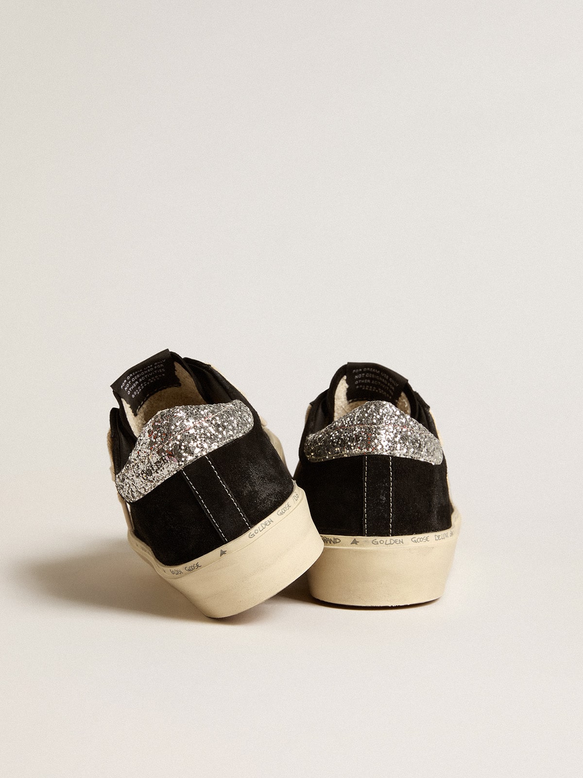 Golden Goose Women’s Hi Star in black leather with silver glitter heel tab