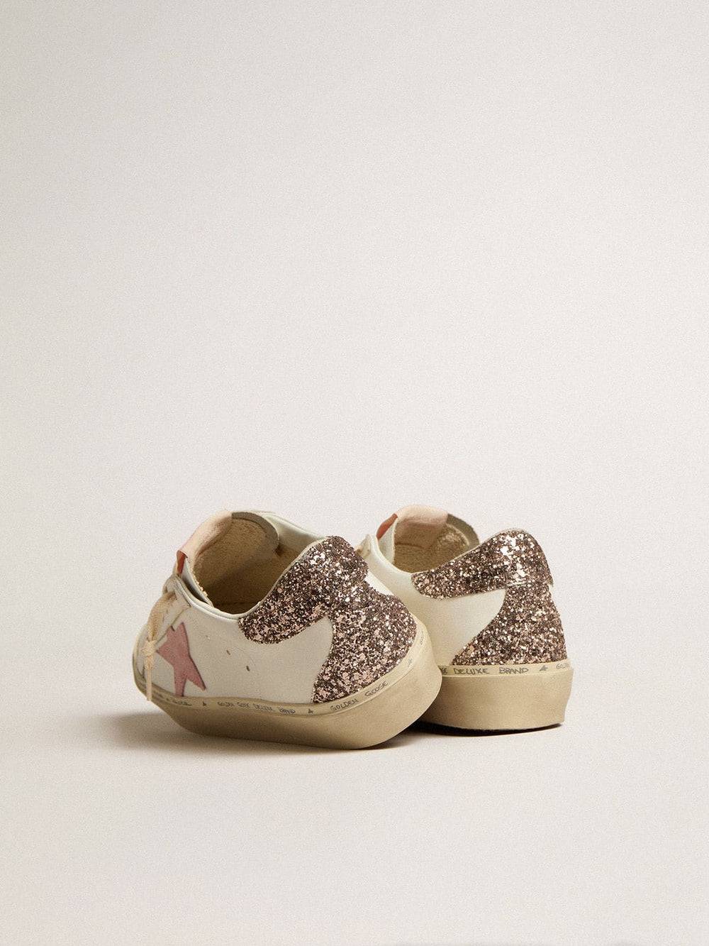 Golden Goose Hi Star in white leather with pink suede star and pink glitter heel tab