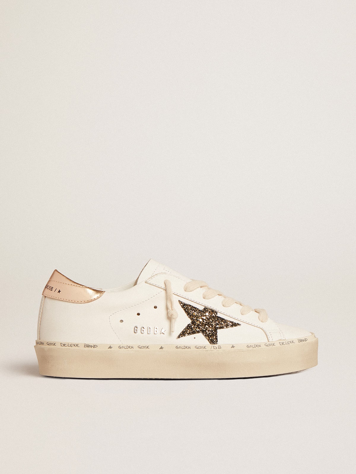 Golden Goose Hi Star  with black and gold glitter star and gold heel tab