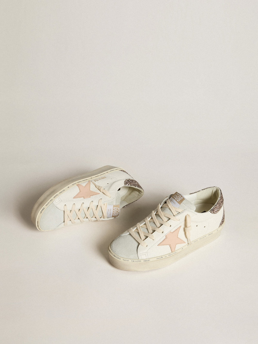Golden Goose Hi Star in white nappa with pink leather star and glitter heel tab
