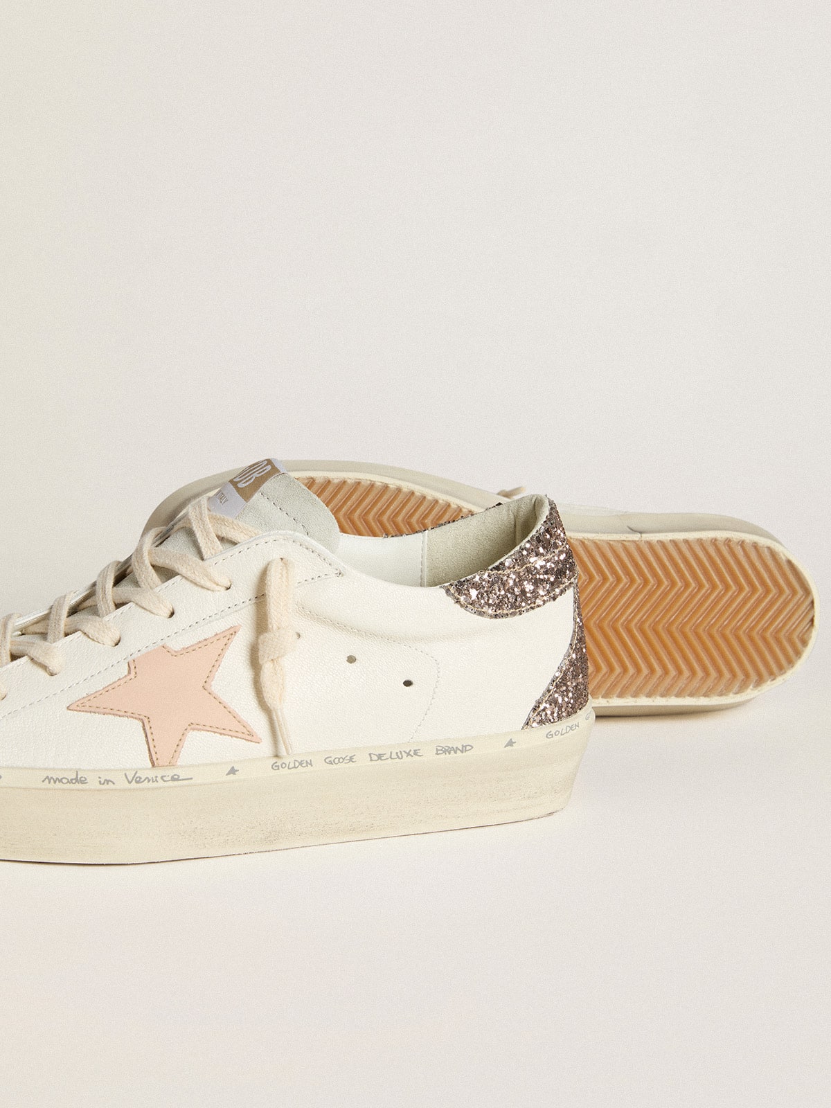 Golden Goose Hi Star in white nappa with pink leather star and glitter heel tab