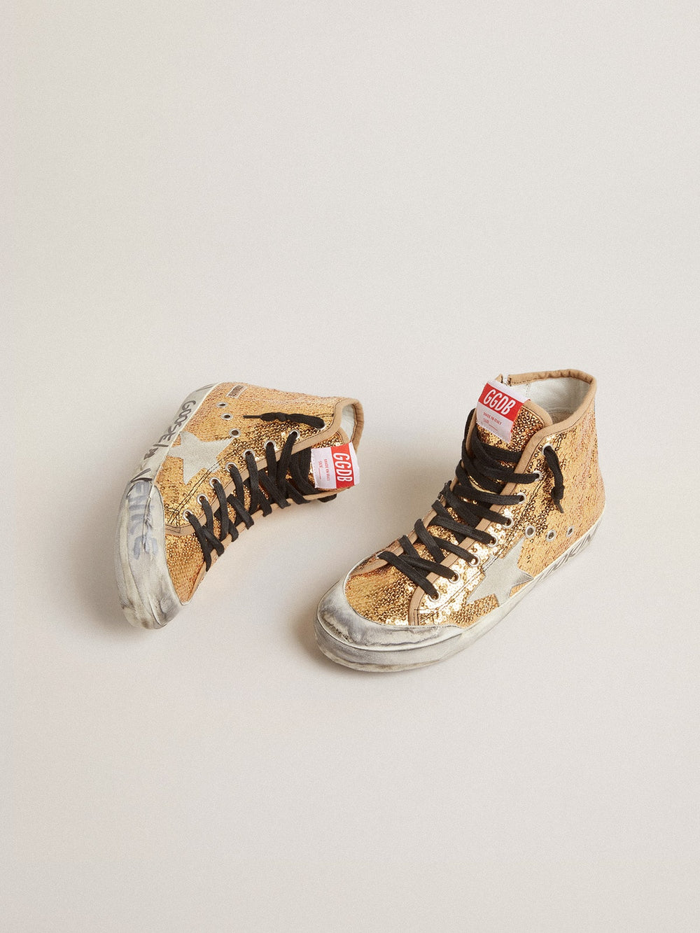 Golden Goose Francy Penstar in gold paiettes with suede star and bright blue heel tab