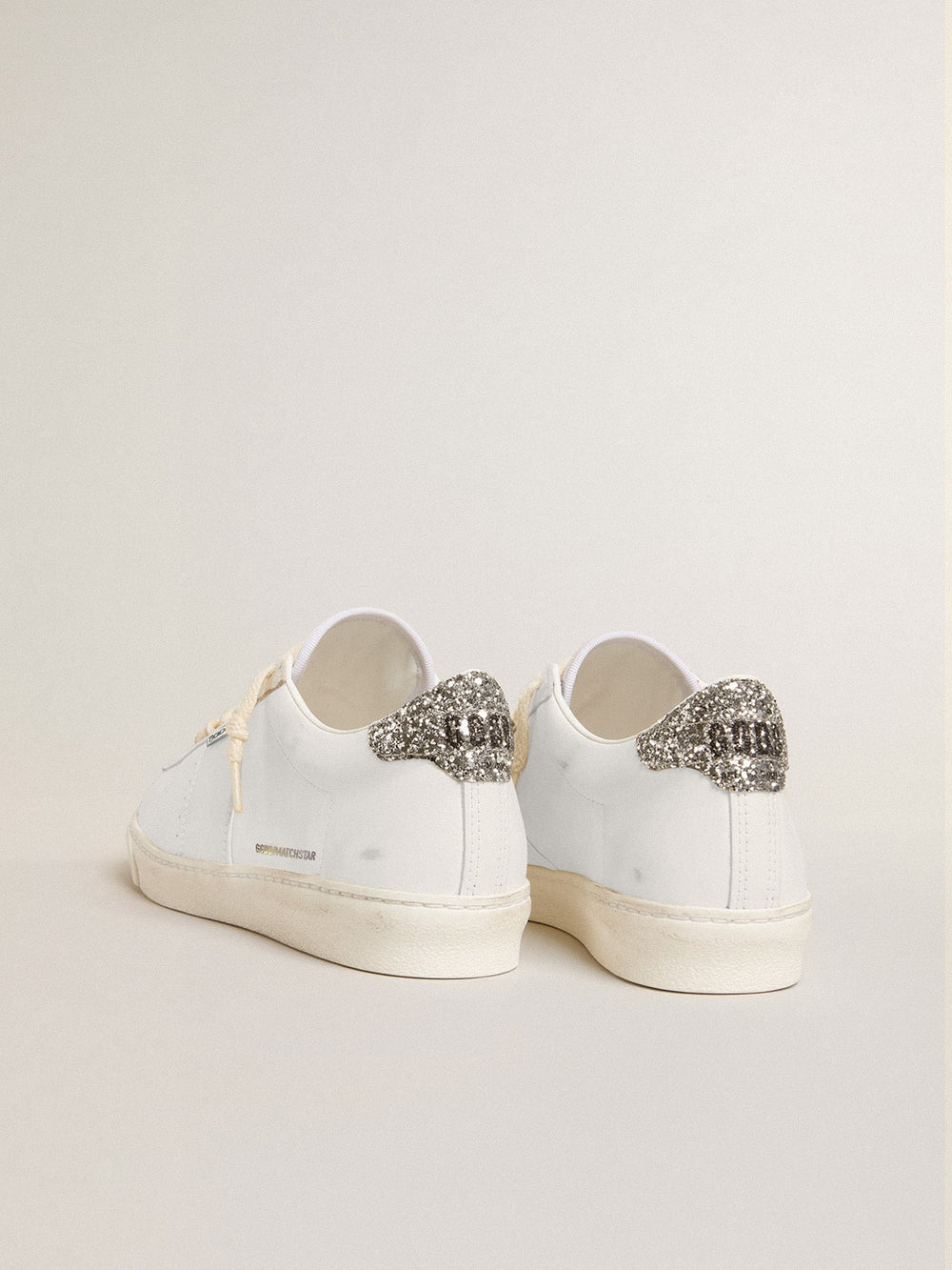 Golden Goose Matchstar in white leather with silver glitter heel tab