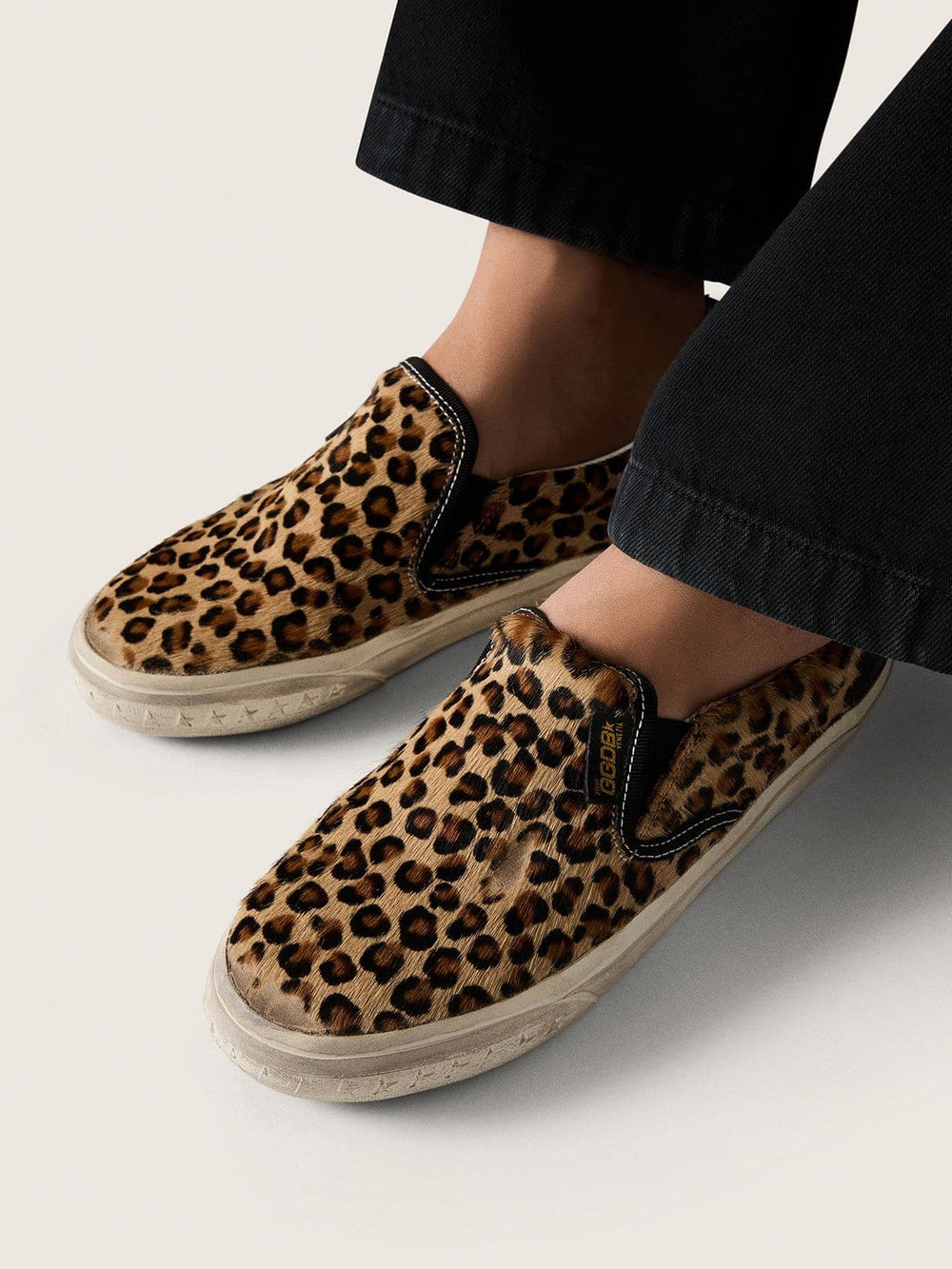 Golden Goose Women's VCE Penstar in leopard-print pony skin with black leather heel tab