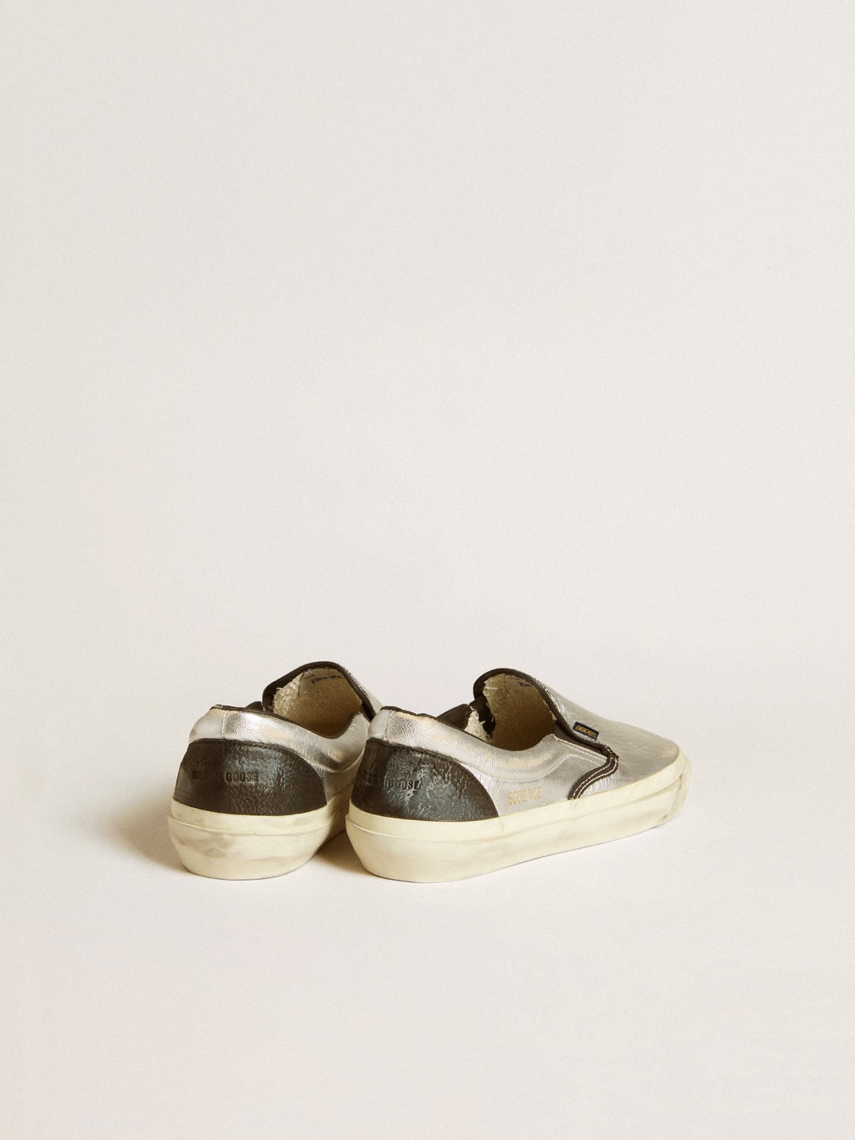 Golden Goose Women's VCE Penstar in metallic silver leather with black leather heel tab