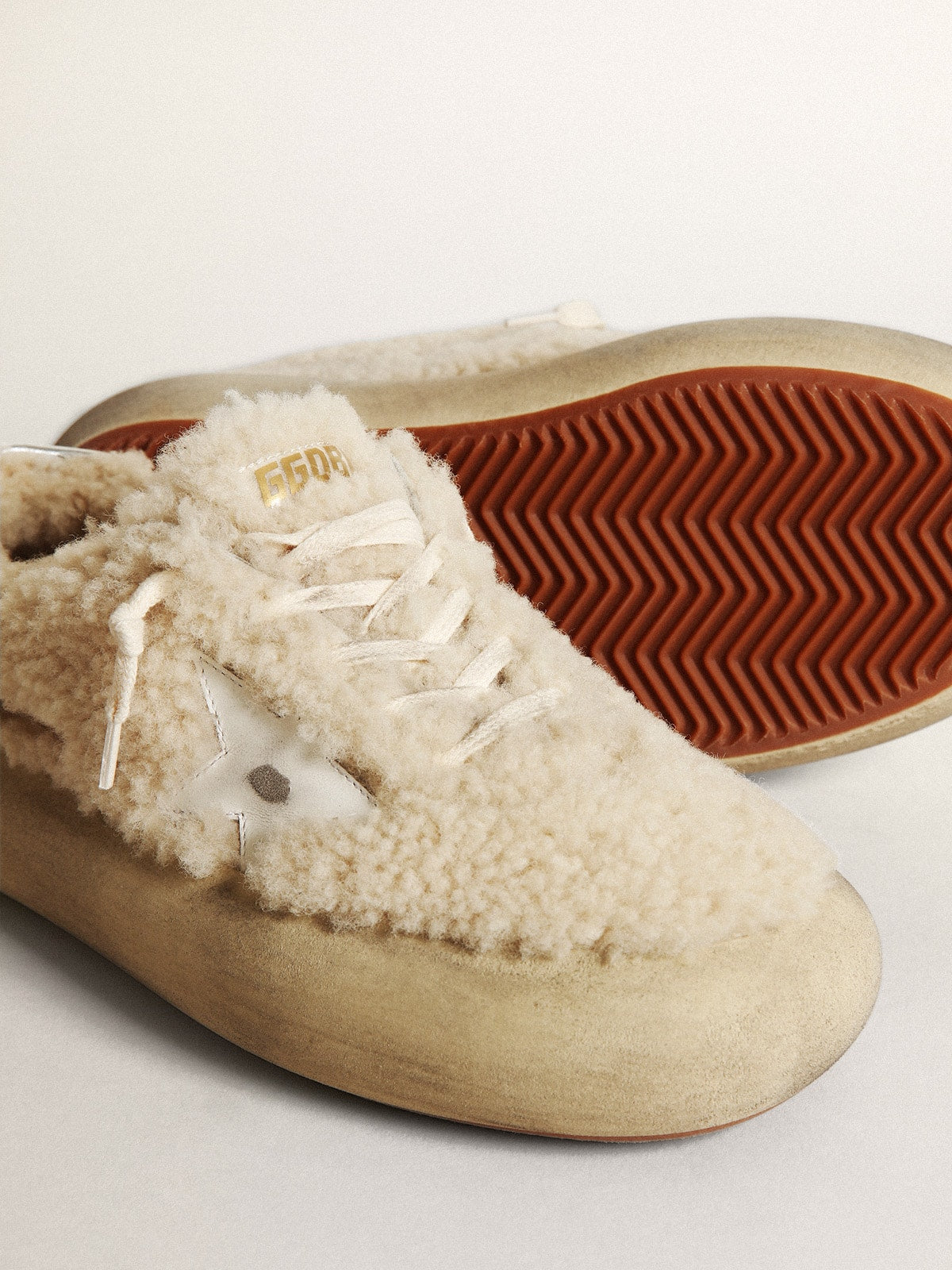 Golden Goose Women’s Space-Star shoes in beige shearling with white leather star and metallic leather heel tab
