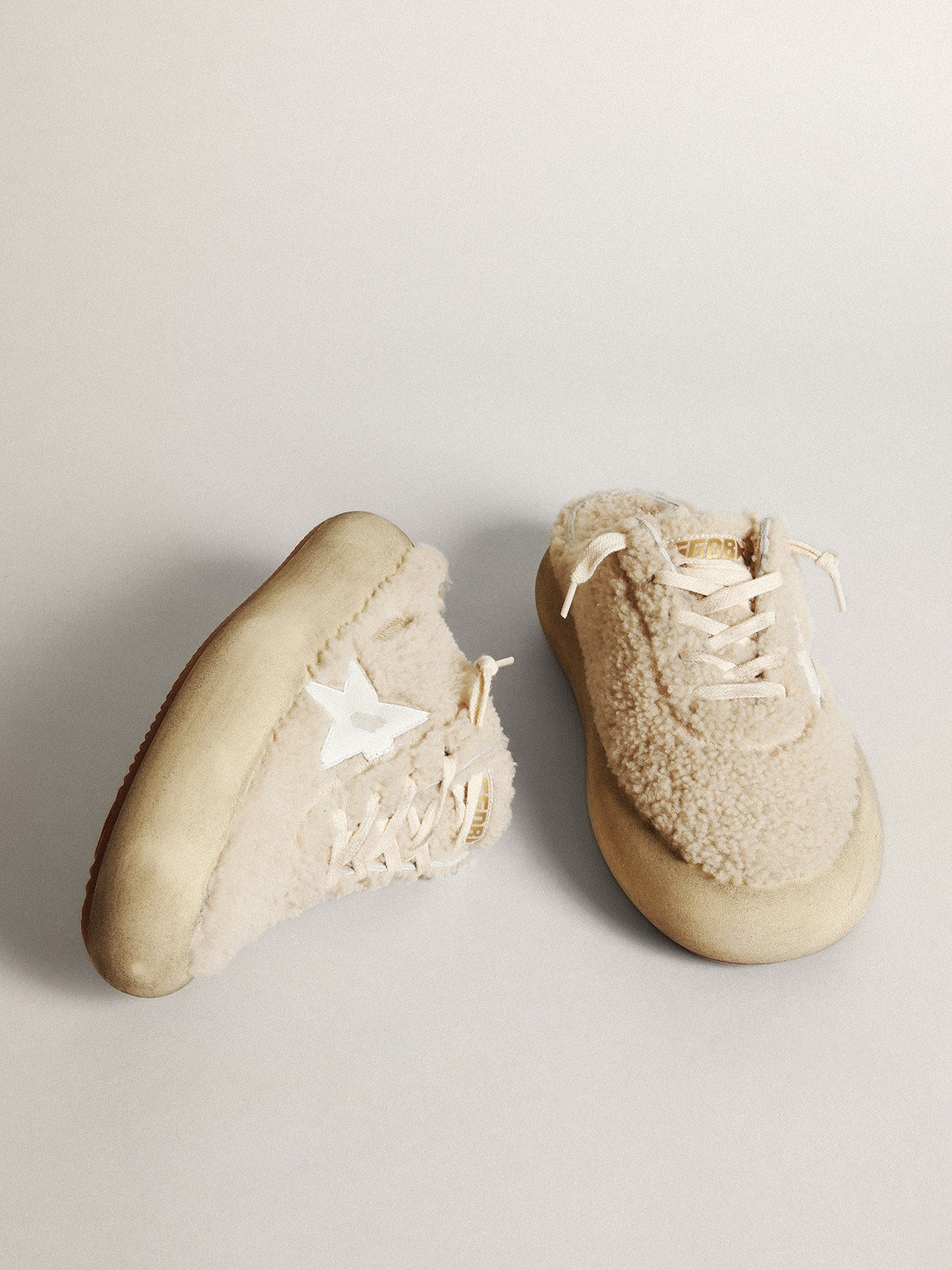 Golden Goose Women’s Space-Star Sabots in beige shearling with white leather star