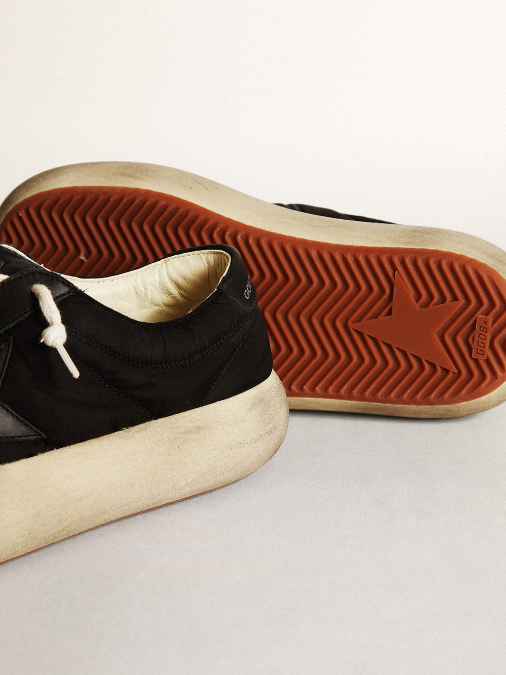 Golden Goose Women's Space-Star shoes in black nylon with black leather star and heel tab