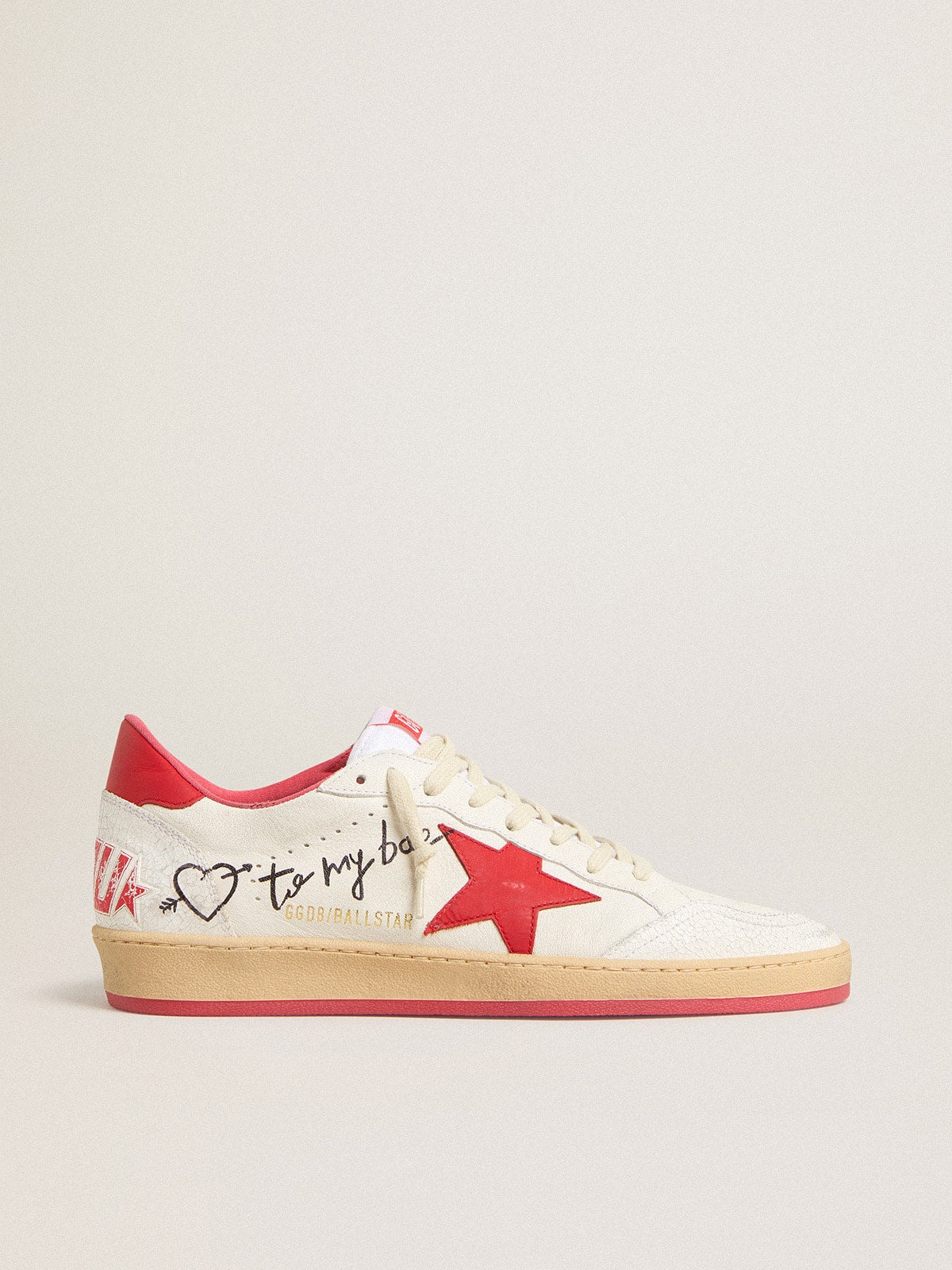Golden Goose Women’s Ball Star Wishes in white leather with a red star and heel tab
