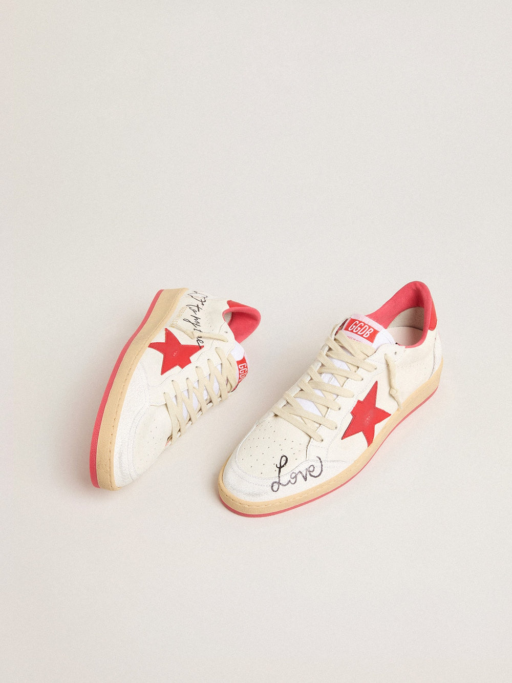 Golden Goose Women’s Ball Star Wishes in white leather with a red star and heel tab