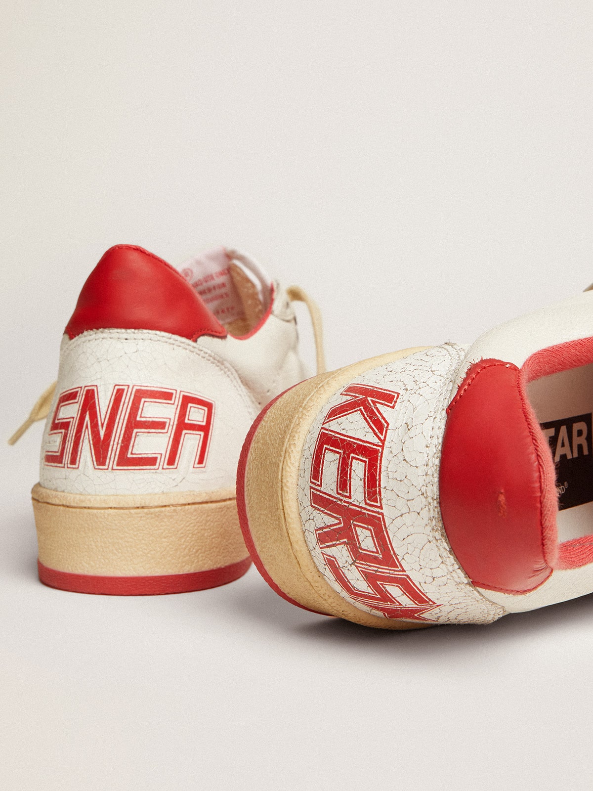 Golden Goose Women's Ball Star in white leather with red star and heel tab