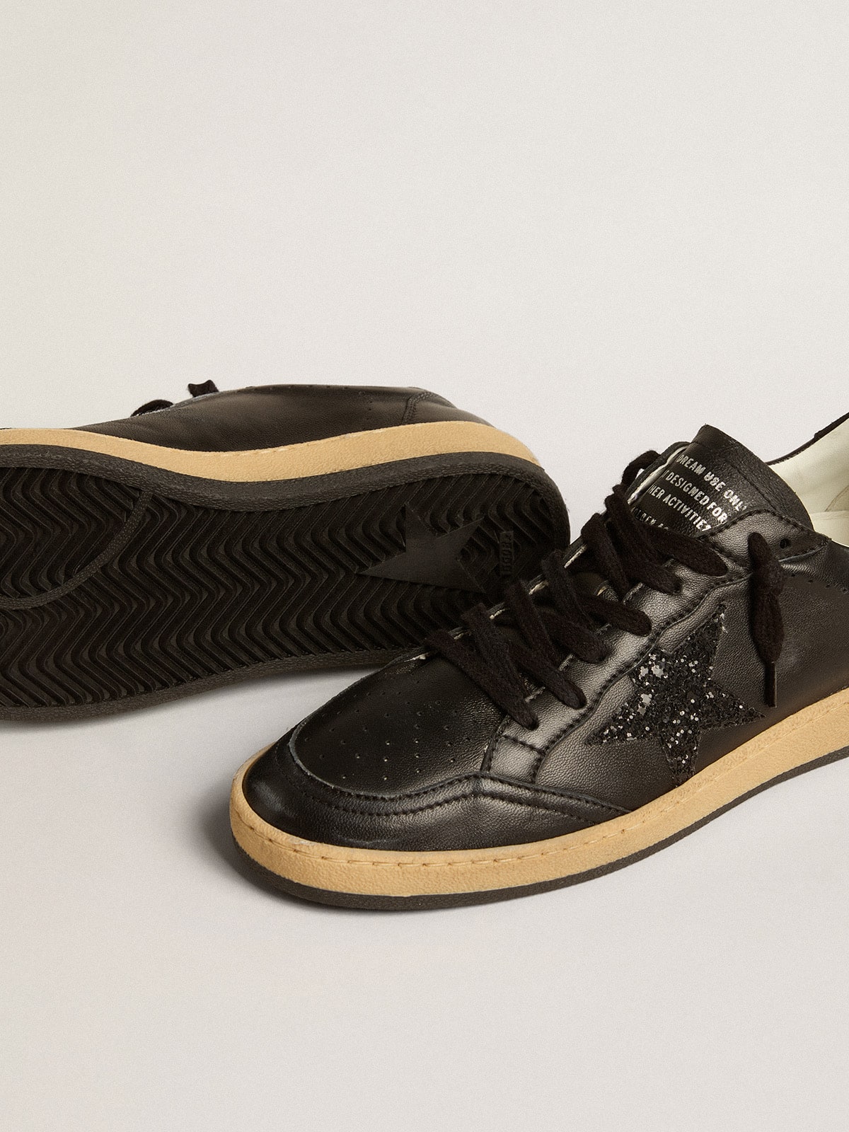 Golden Goose Women’s Ball Star in black nappa with black glitter star and suede heel tab