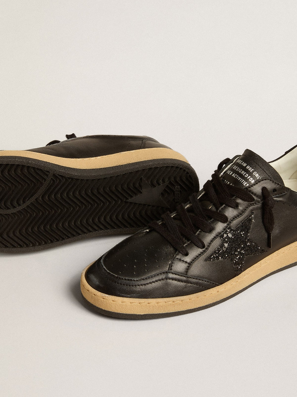 Golden Goose Women’s Ball Star in black nappa with black glitter star and suede heel tab