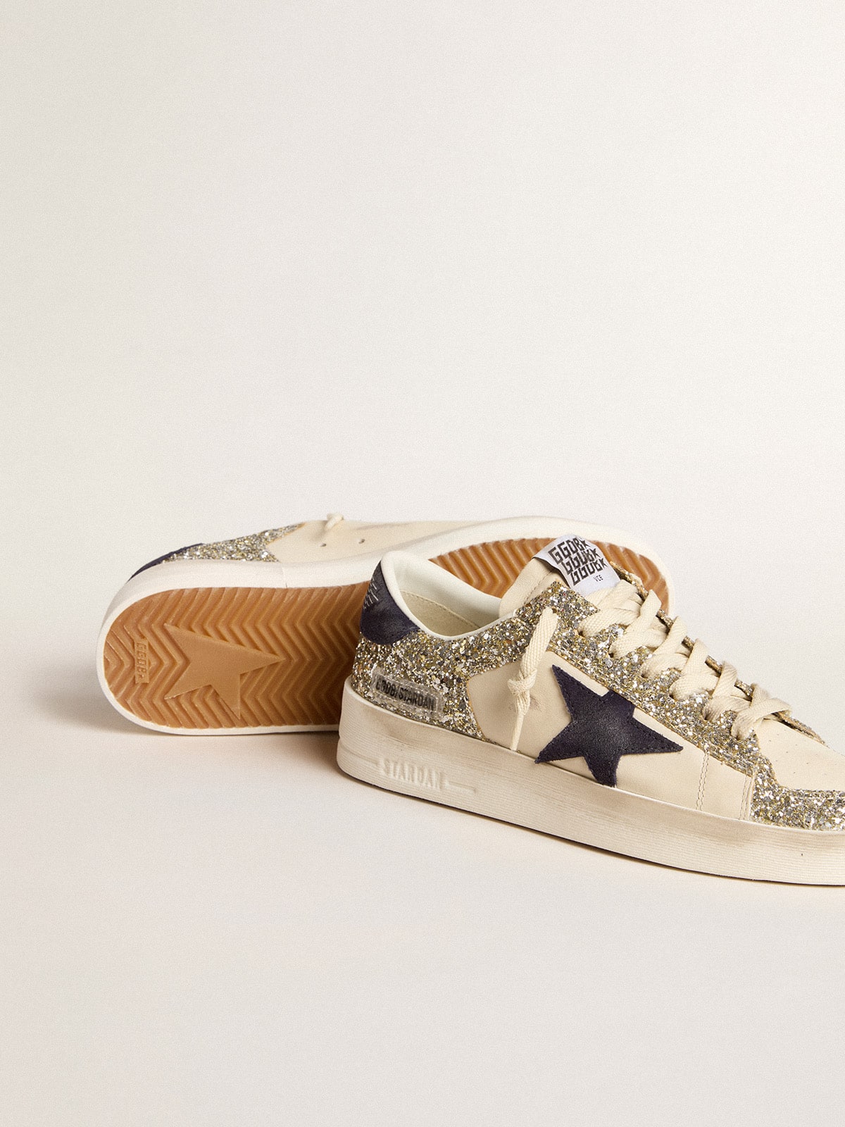 Golden Goose Women's Stardan in platinum glitter with dark blue suede star and heel tab