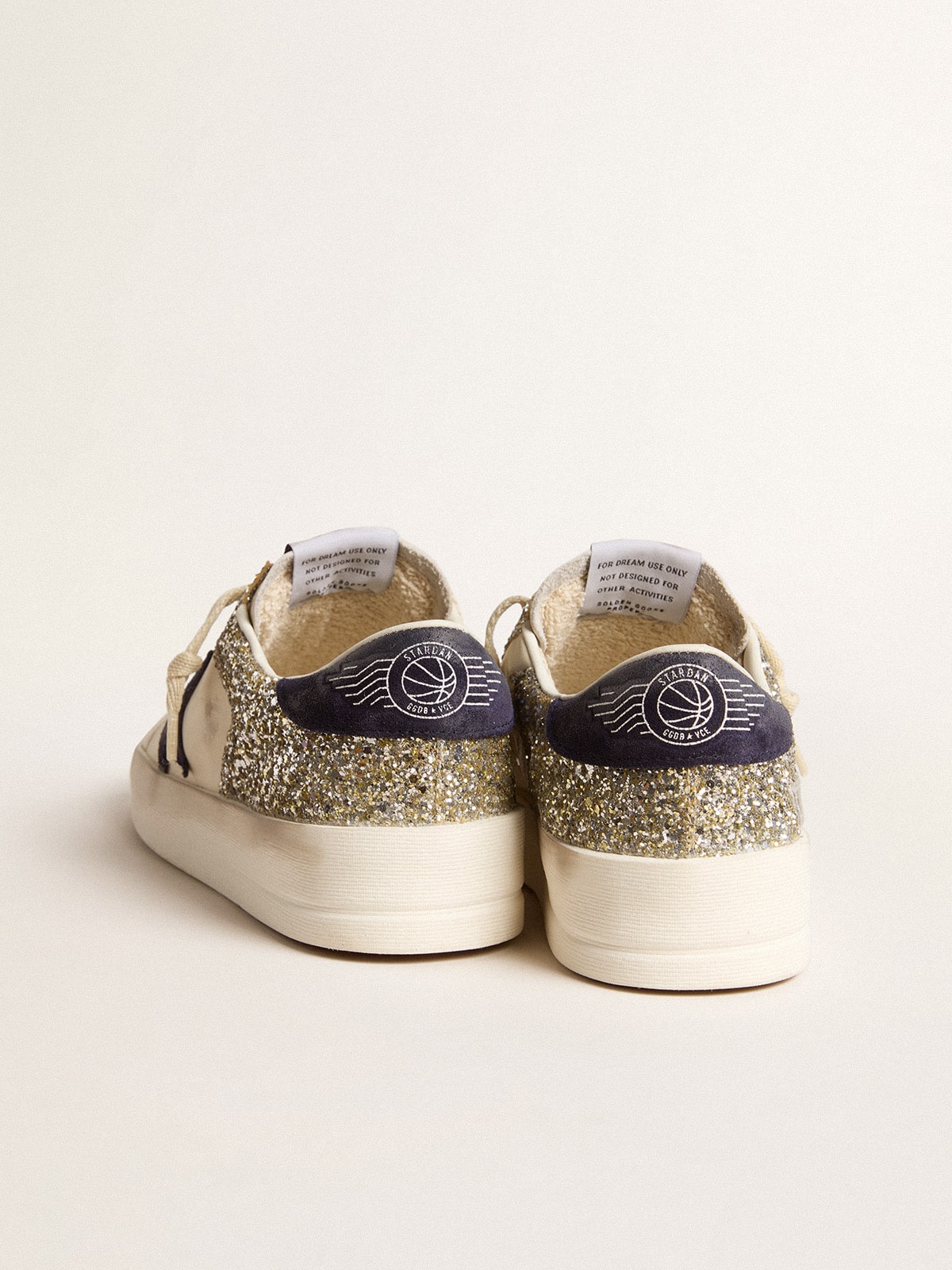 Golden Goose Women's Stardan in platinum glitter with dark blue suede star and heel tab