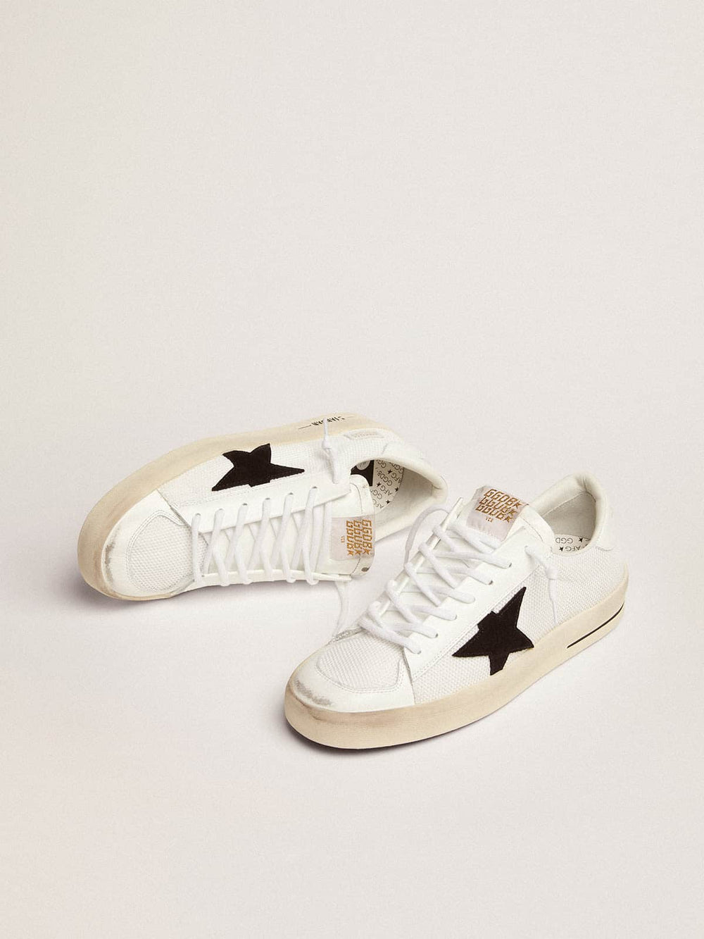 Golden Goose Stardan with white leather and mesh inserts and black suede star