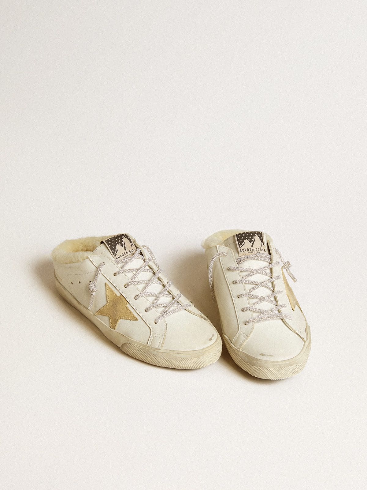 Golden Goose Women’s Super-Star Sabots with gold suede star and shearling lining