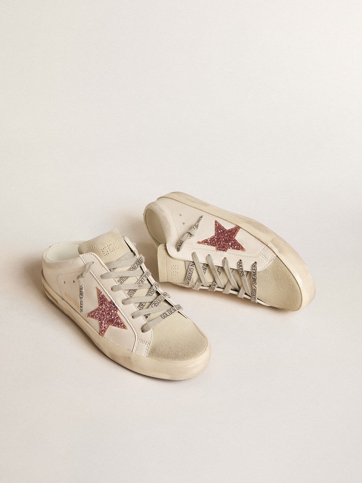 Golden Goose Bio-based Super-Star Sabot with pink glitter star and suede toe