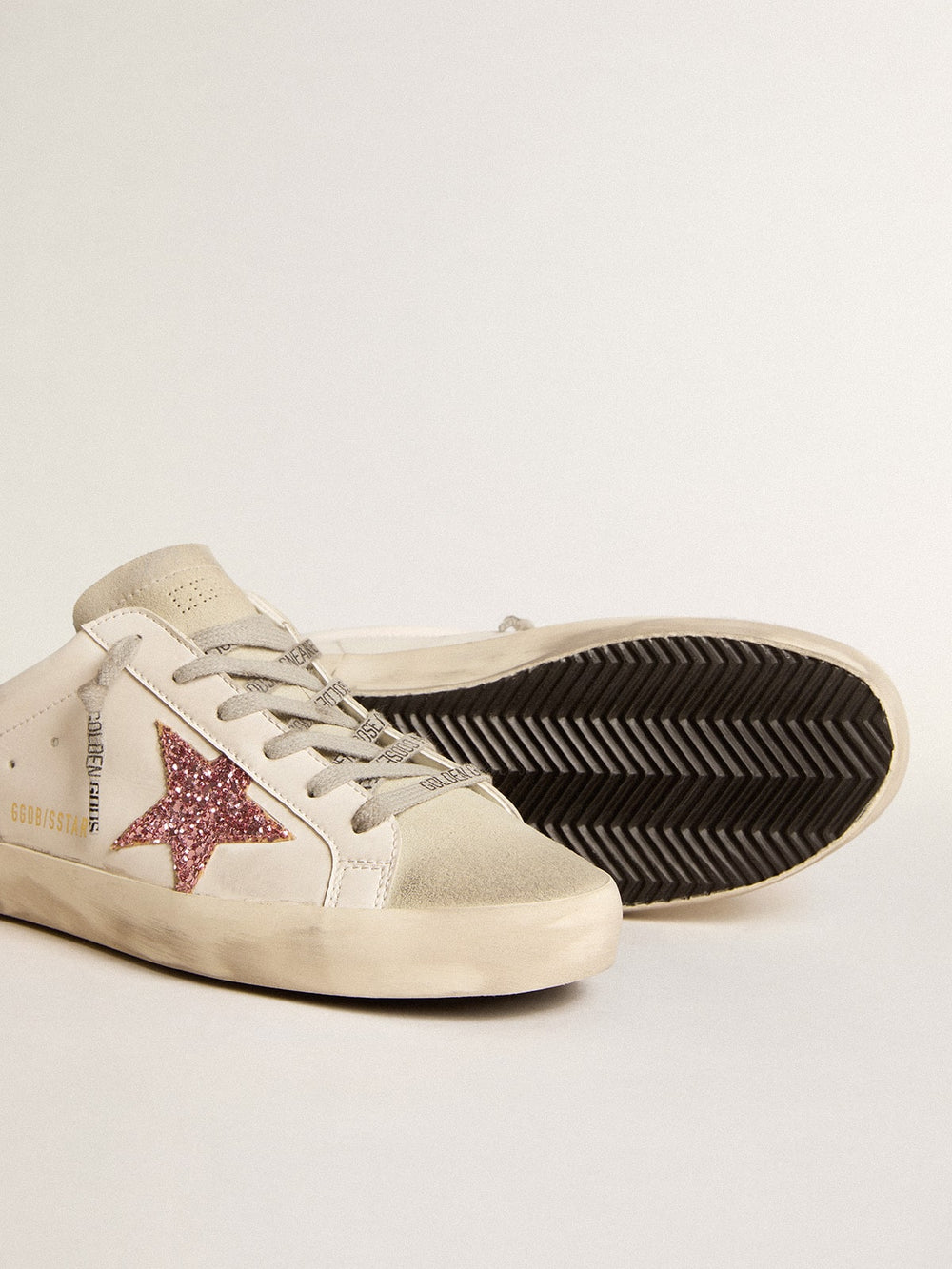 Golden Goose Bio-based Super-Star Sabot with pink glitter star and suede toe