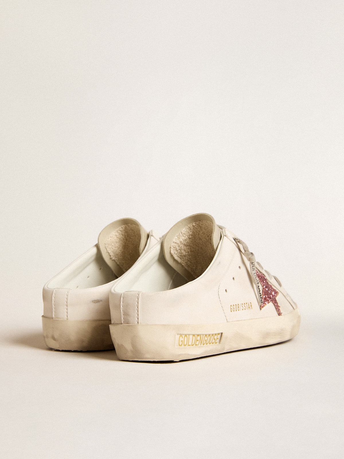 Golden Goose Bio-based Super-Star Sabot with pink glitter star and suede toe