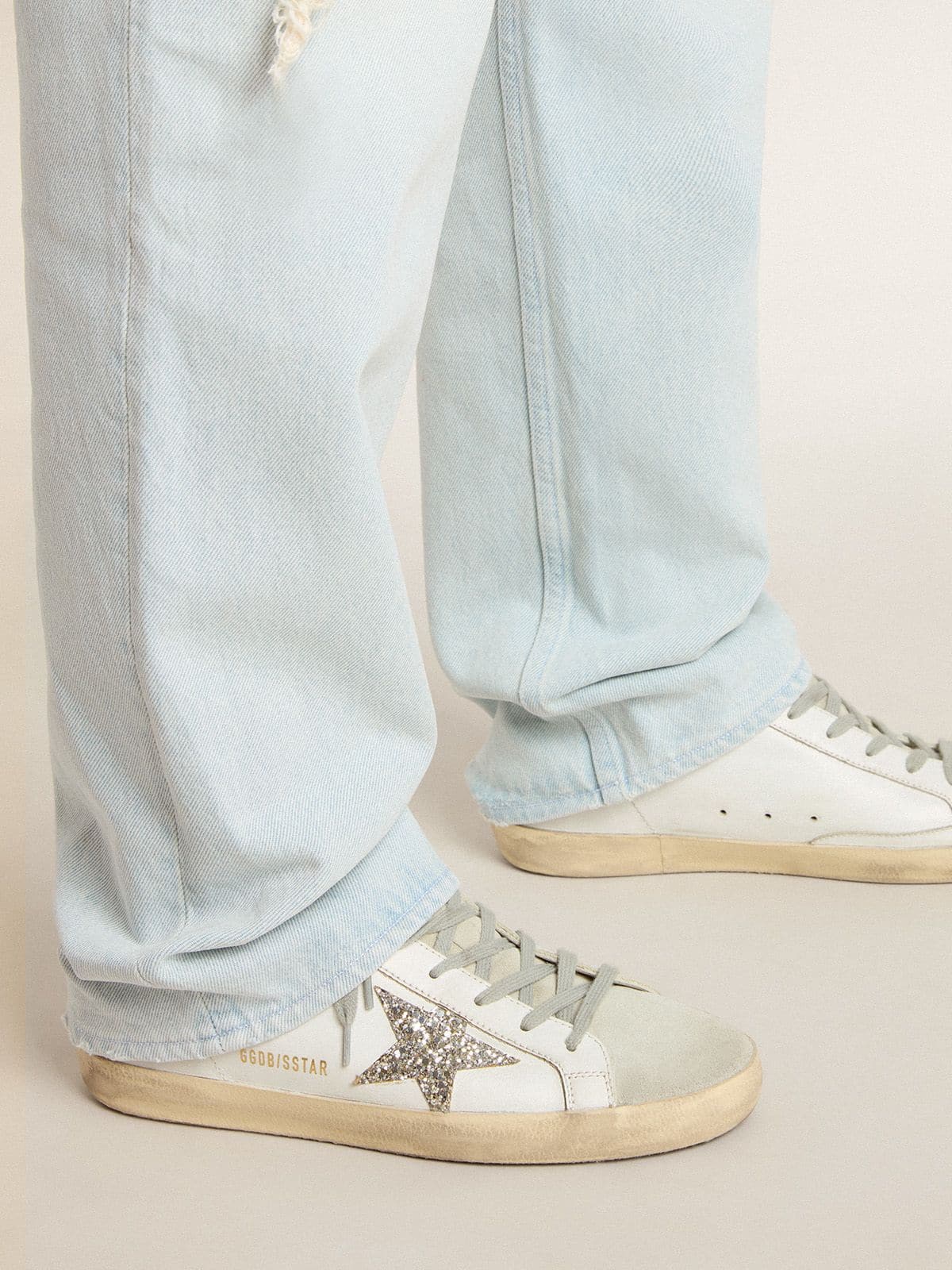 Golden Goose Super-Star Sabot with a platinum glitter star and suede tongue