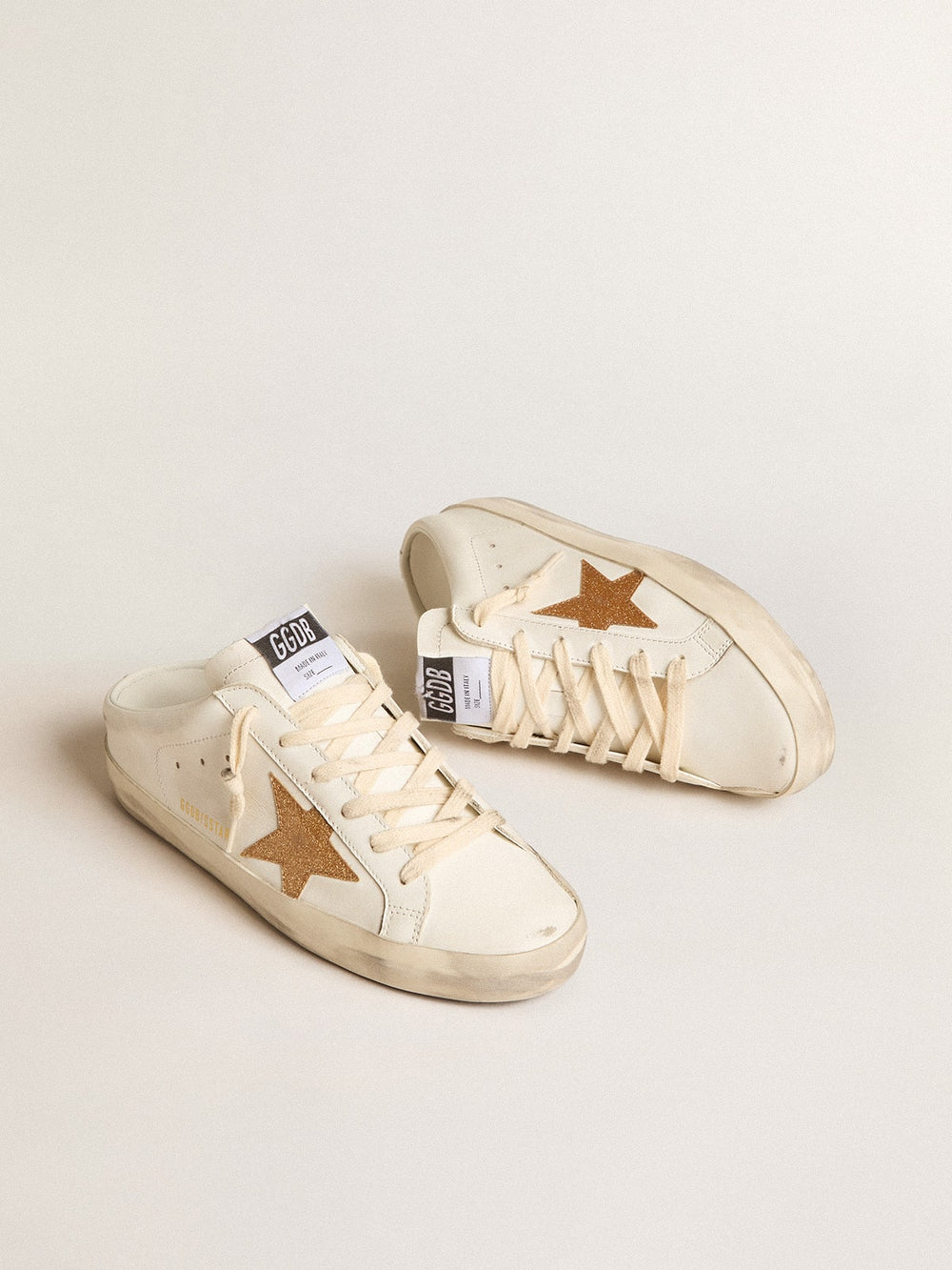 Golden Goose Super-Star Sabots in leather with plasticized gold glitter star