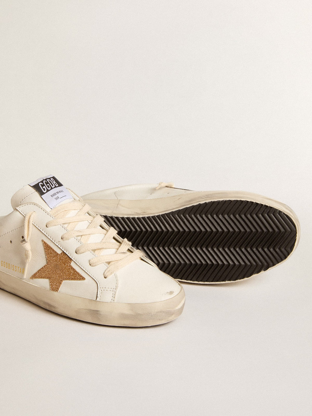 Golden Goose Super-Star Sabots in leather with plasticized gold glitter star