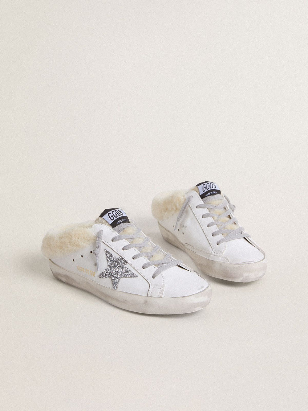 Golden Goose Super-Star Sabots in white leather with shearling lining and silver star