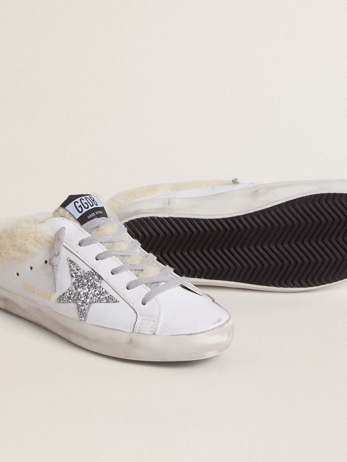 Golden Goose Super-Star Sabots in white leather with shearling lining and silver star