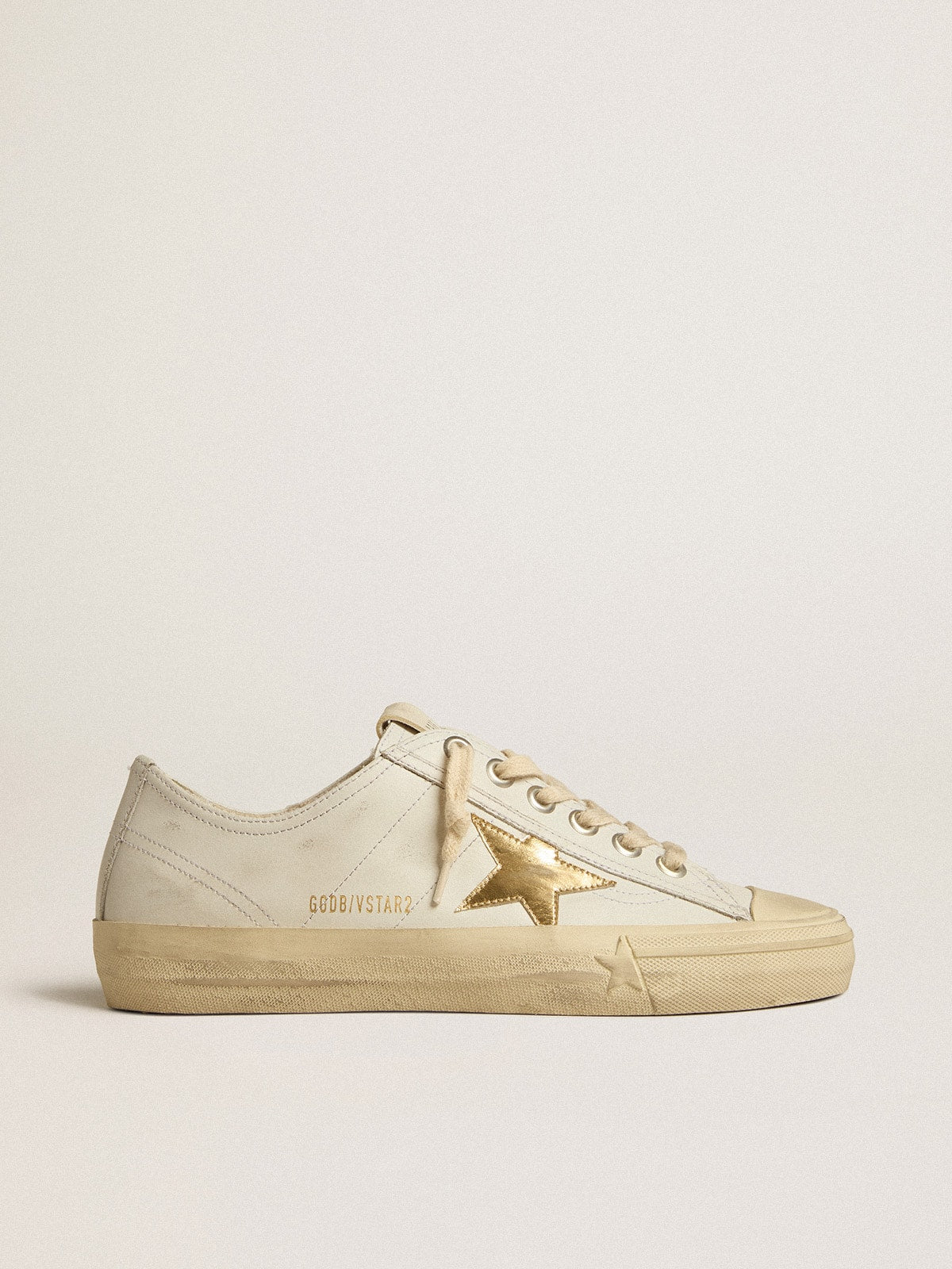 Golden Goose V-Star in white leather with gold metallic leather star