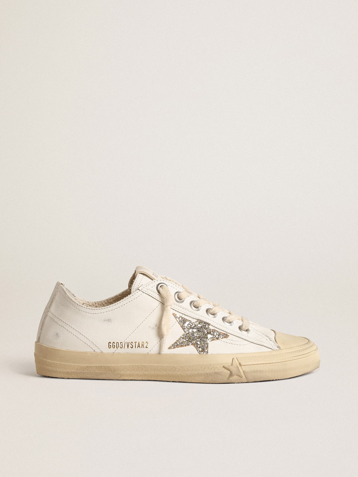 Golden Goose V-Star in white leather with a platinum glitter star