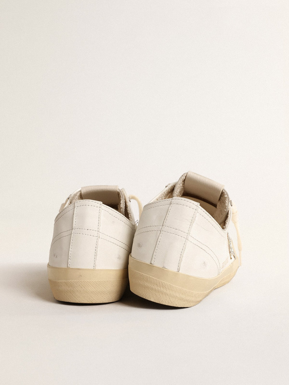 Golden Goose V-Star in white leather with a platinum glitter star