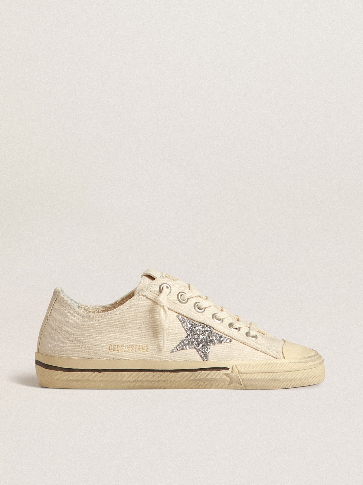Golden Goose V-Star in beige canvas with a silver glitter star