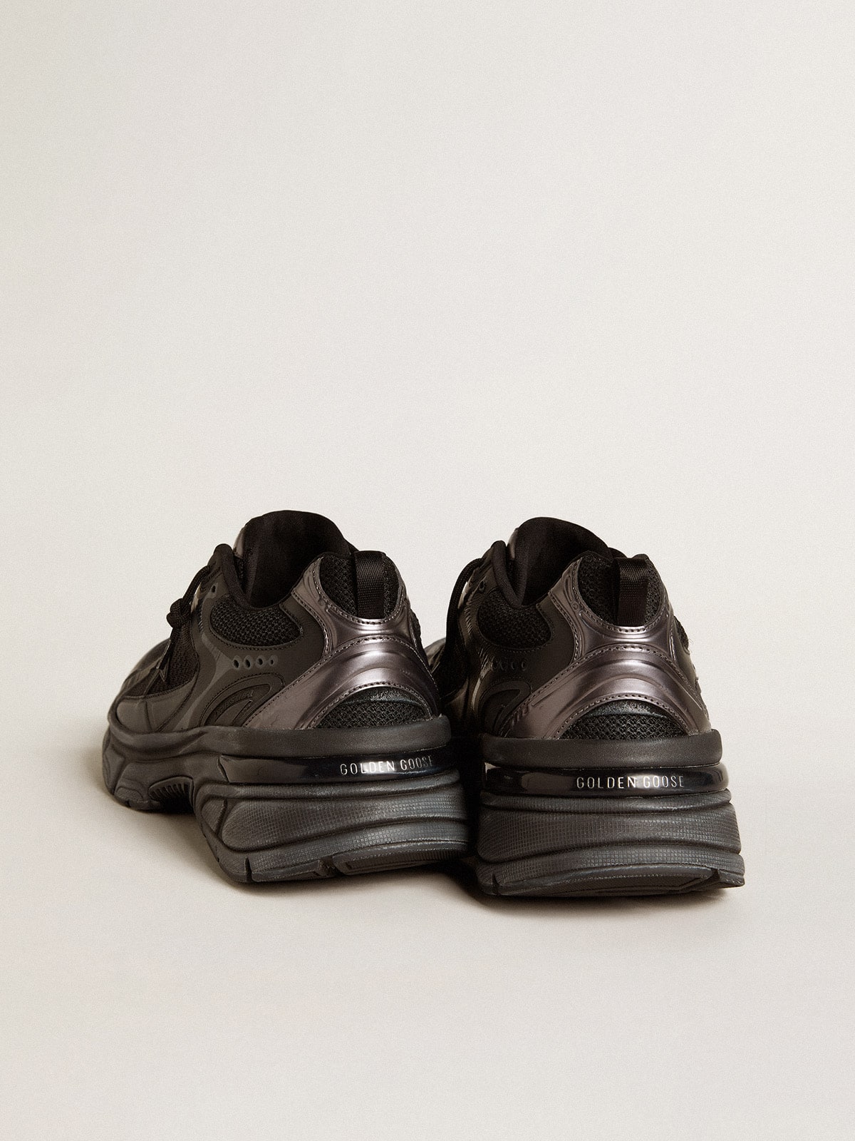 Golden Goose Women’s Lightstar with black leather and mesh upper and black star