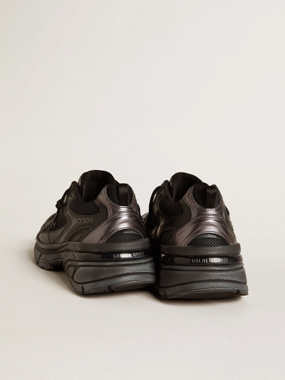Golden Goose Women’s Lightstar with black leather and mesh upper and black star