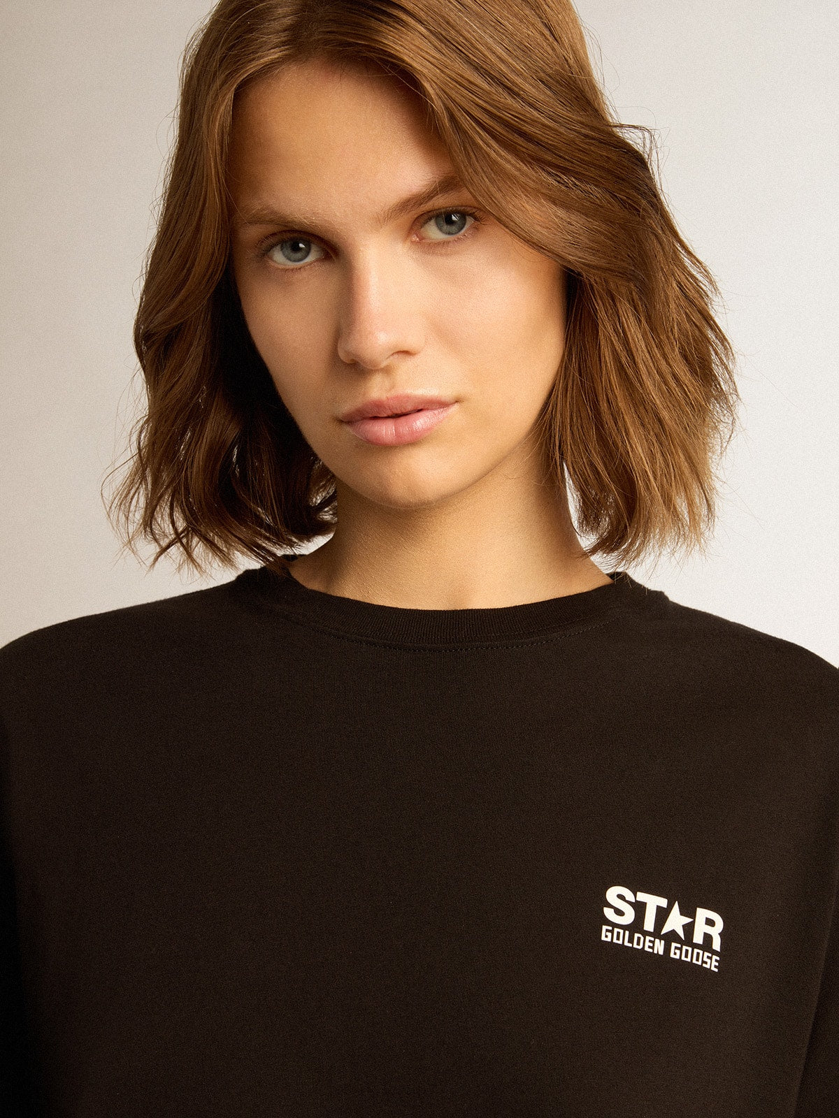 Golden Goose Black Star Collection T-shirt with contrasting white logo and star